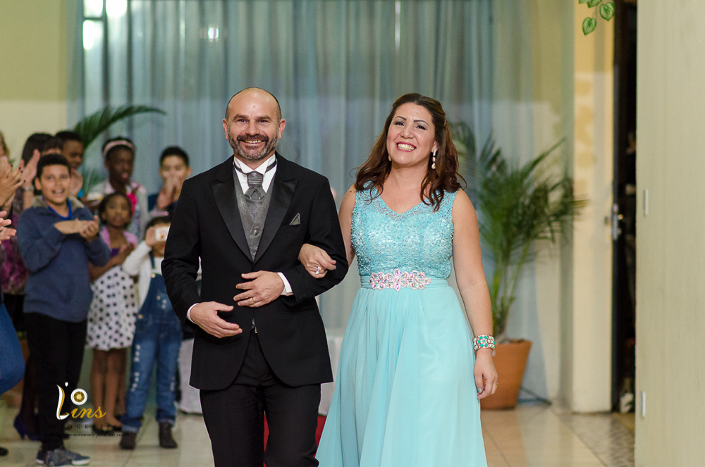 entrada dos pais da debutante na festa