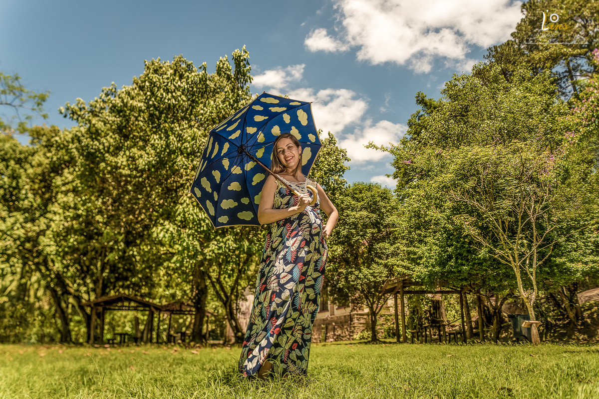 gestante foto com guarda chuva