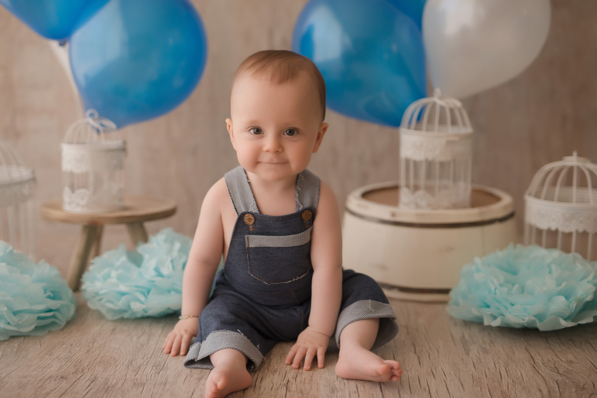 foto de familia em caxias do sul fotografa morgana perini menino sentado serio