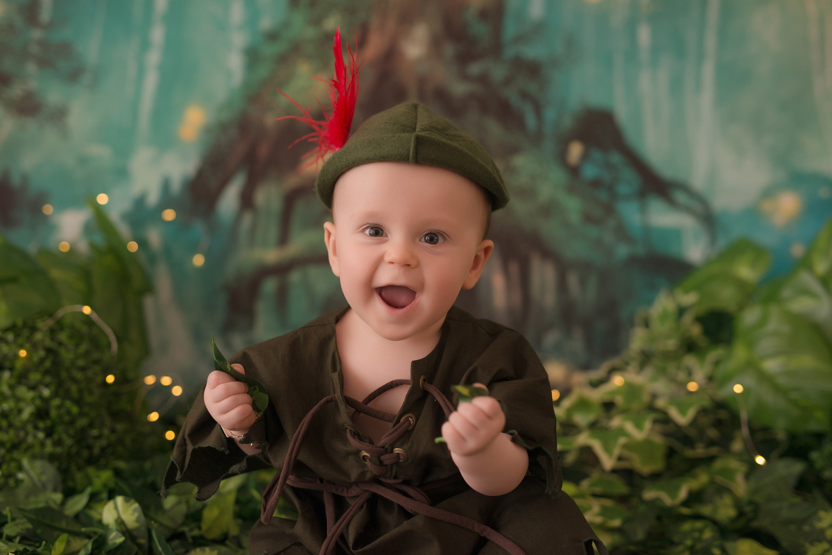 foto de familia em caxias do sul fotografa morgana perini menino de peter pan sorrindo