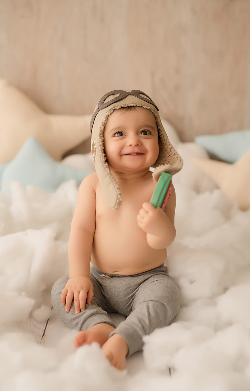 foto de bebe em caxias do sul fotografa morgana perini bebe sorrindo aviador