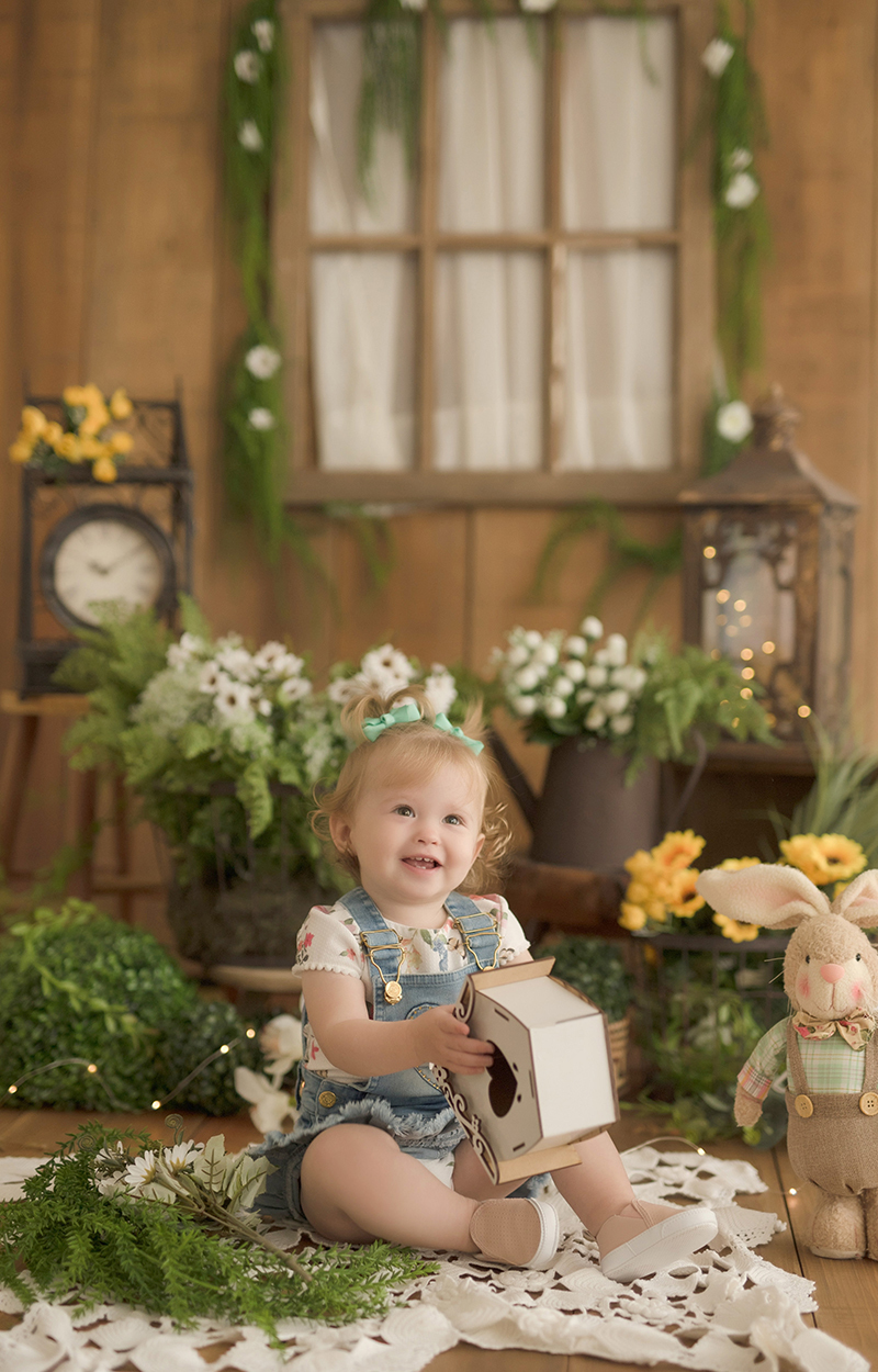 foto de bebe em caxias do sul fotografa morgana perini menina sorrindo com coelho