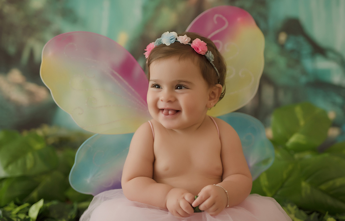 foto de bebe em caxias do sul fotografa morgana perini menina vestida de fada sorrindo