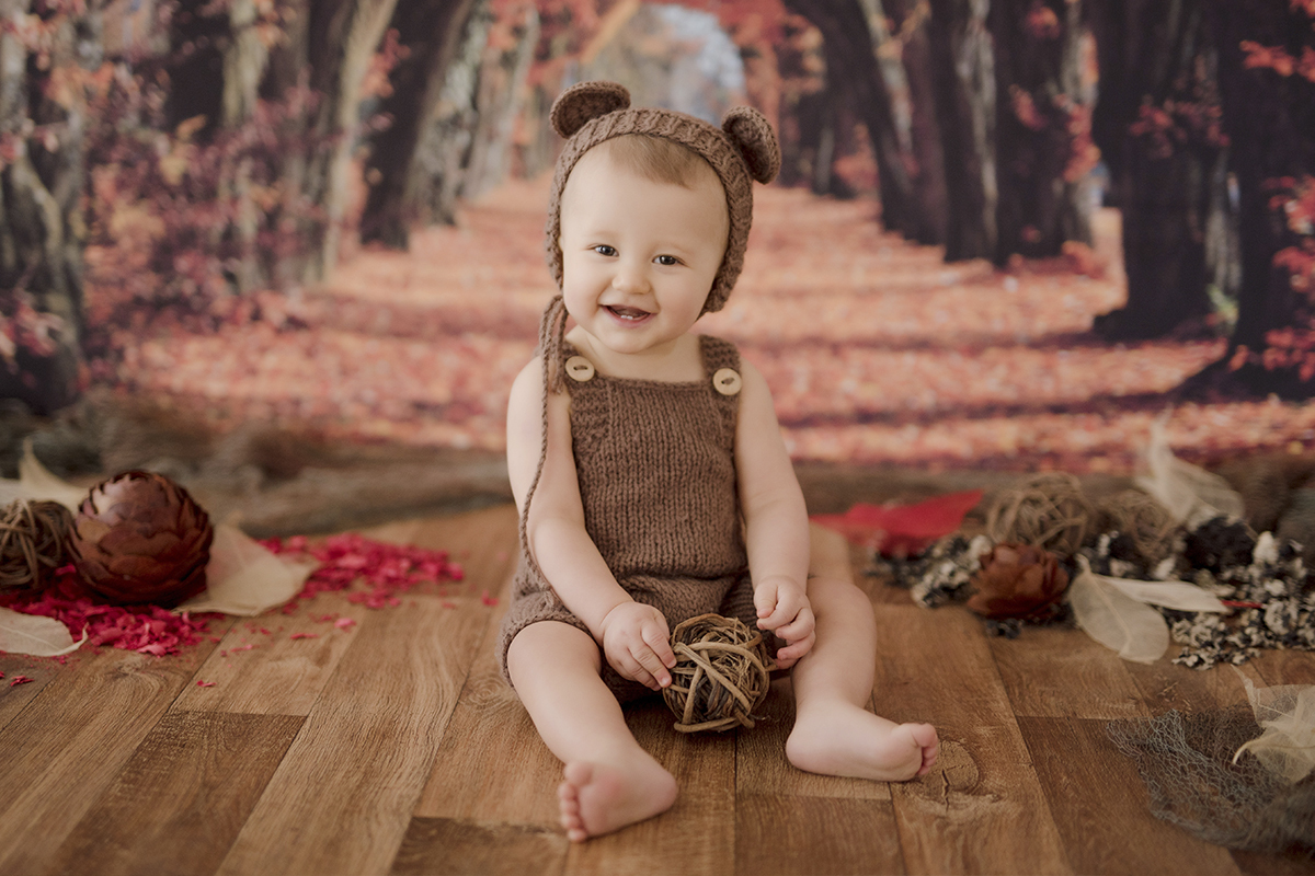 foto de bebe em caxias do sul fotografa morgana perini bebe de urso em fundo de floresta