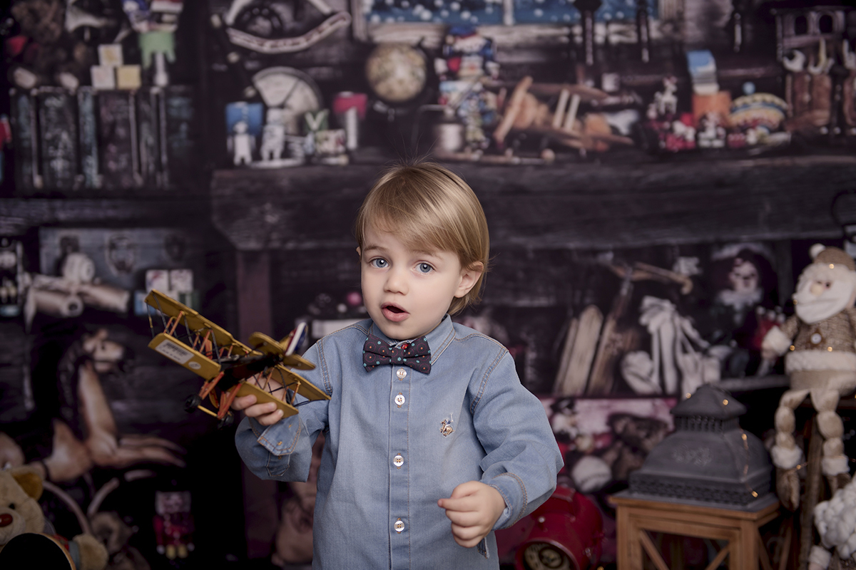 Foto criança em caxias do sul fotografa morgana perini roupa azul aviao