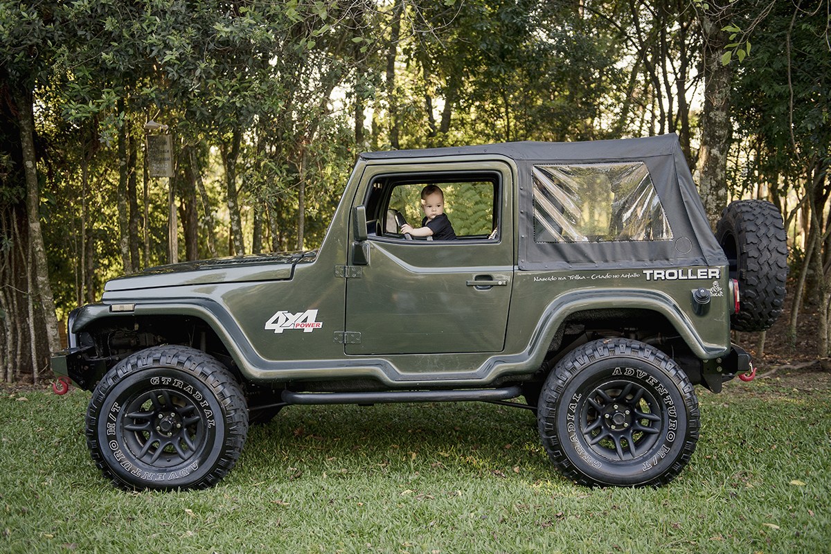 Foto de bebe em caxias do sul fotografa morgana perini bebe carro dirigindo verde