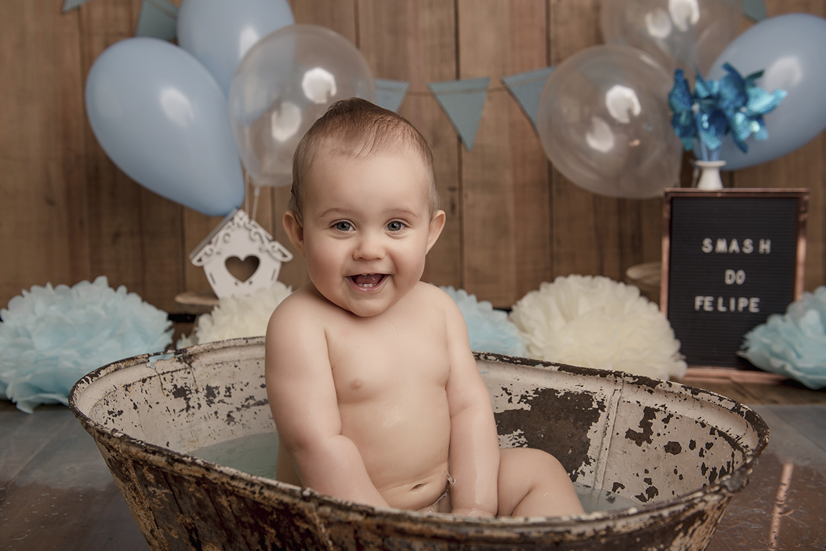 Foto de smash em caxias do sul fotografa morgana perini bebe sorrindo banheira
