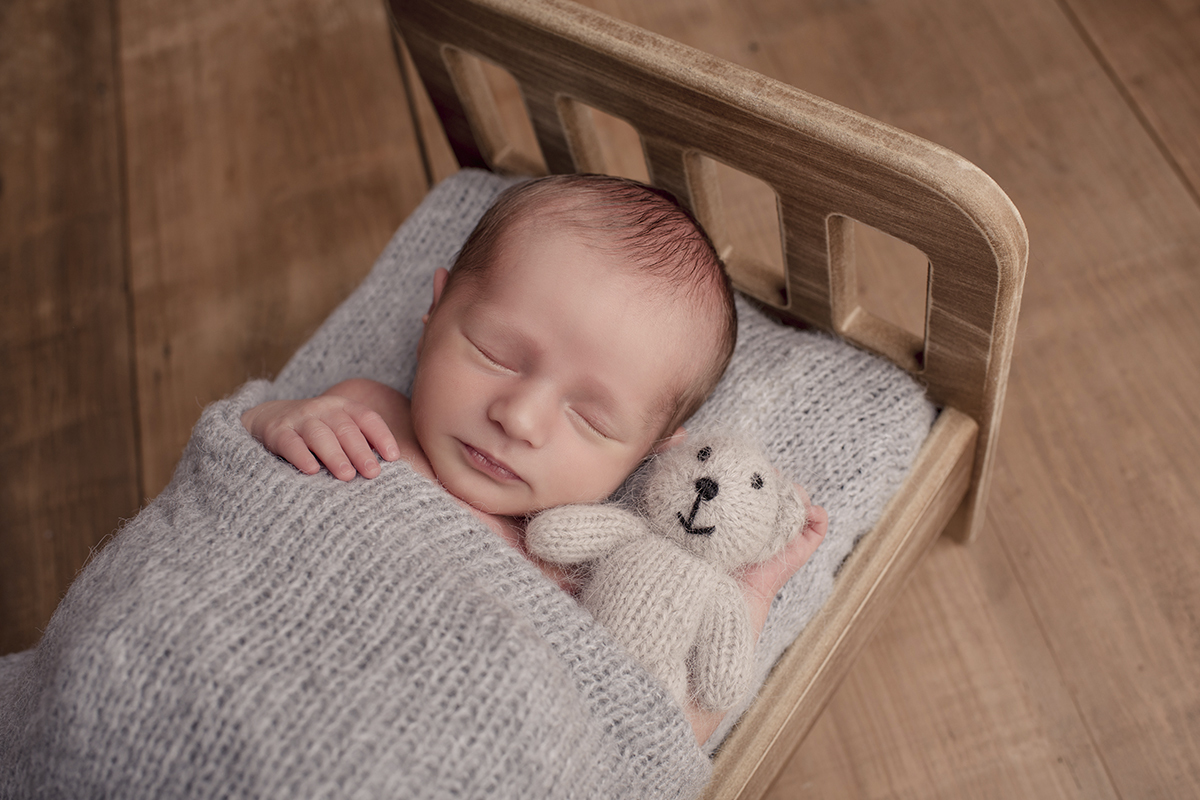 bebe dormindo caminha urso