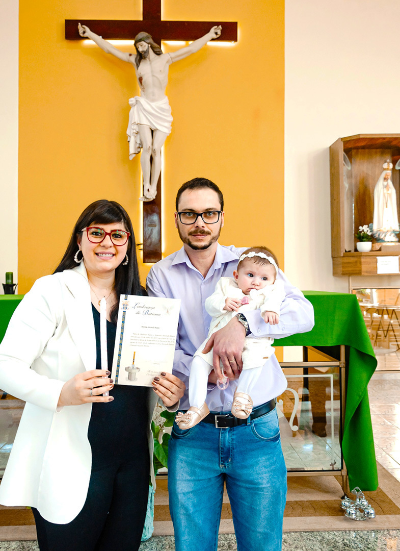 Papai, mamãe e filhinha.