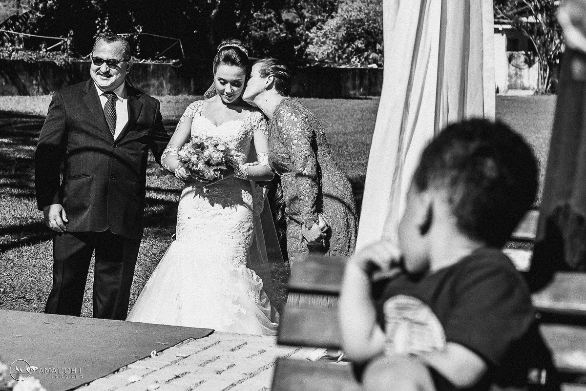 entrada da noiva com os pais