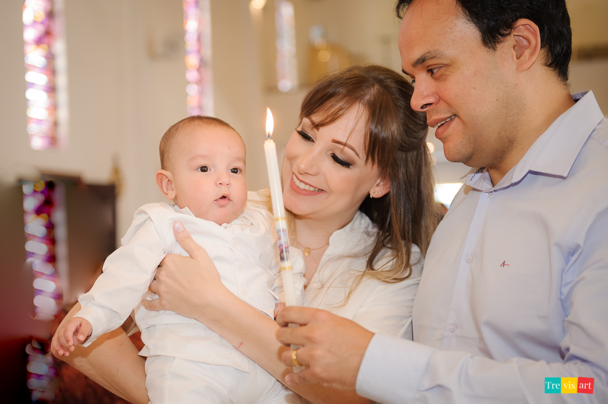 pai e mãe no batizado