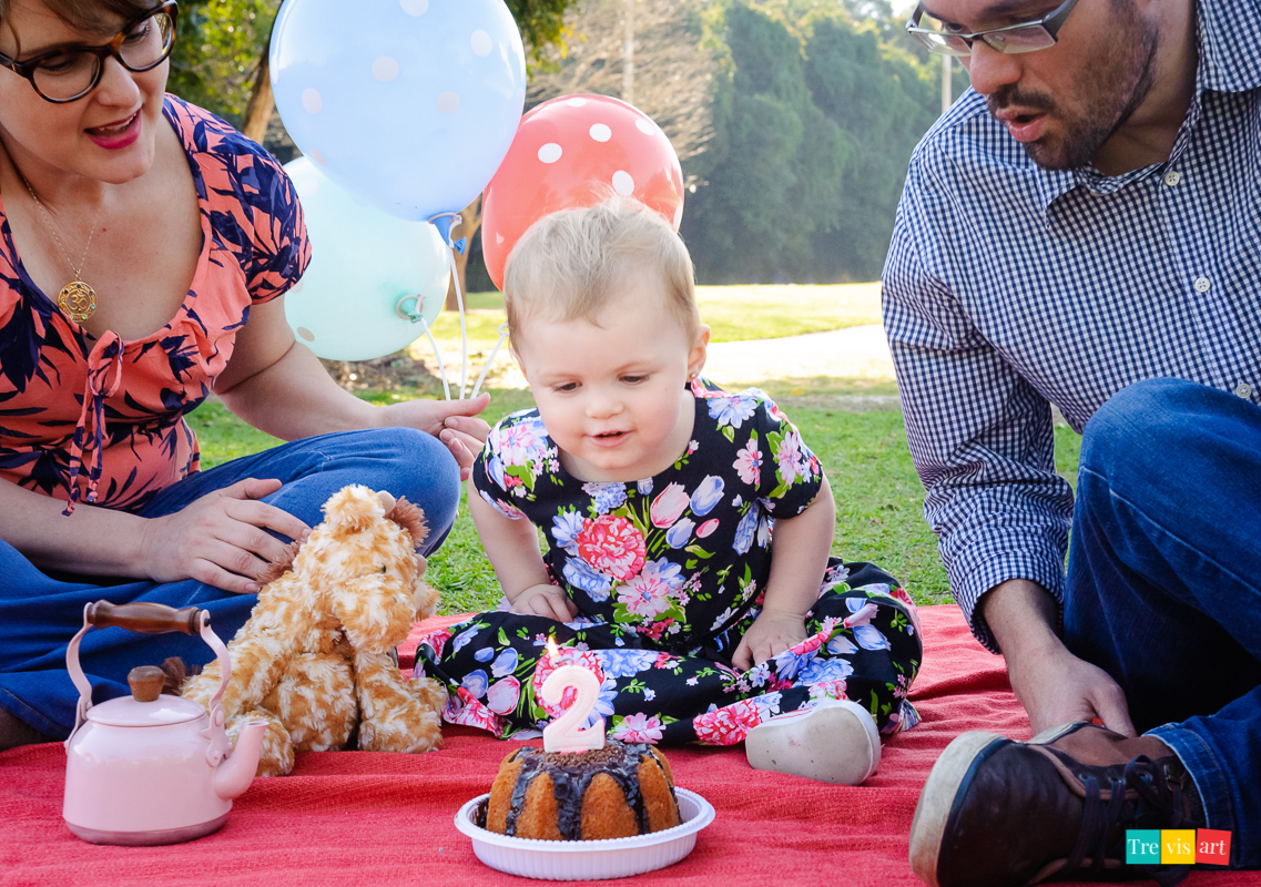criança assoprando a vela, ensaio fotografico no MON de aniversario