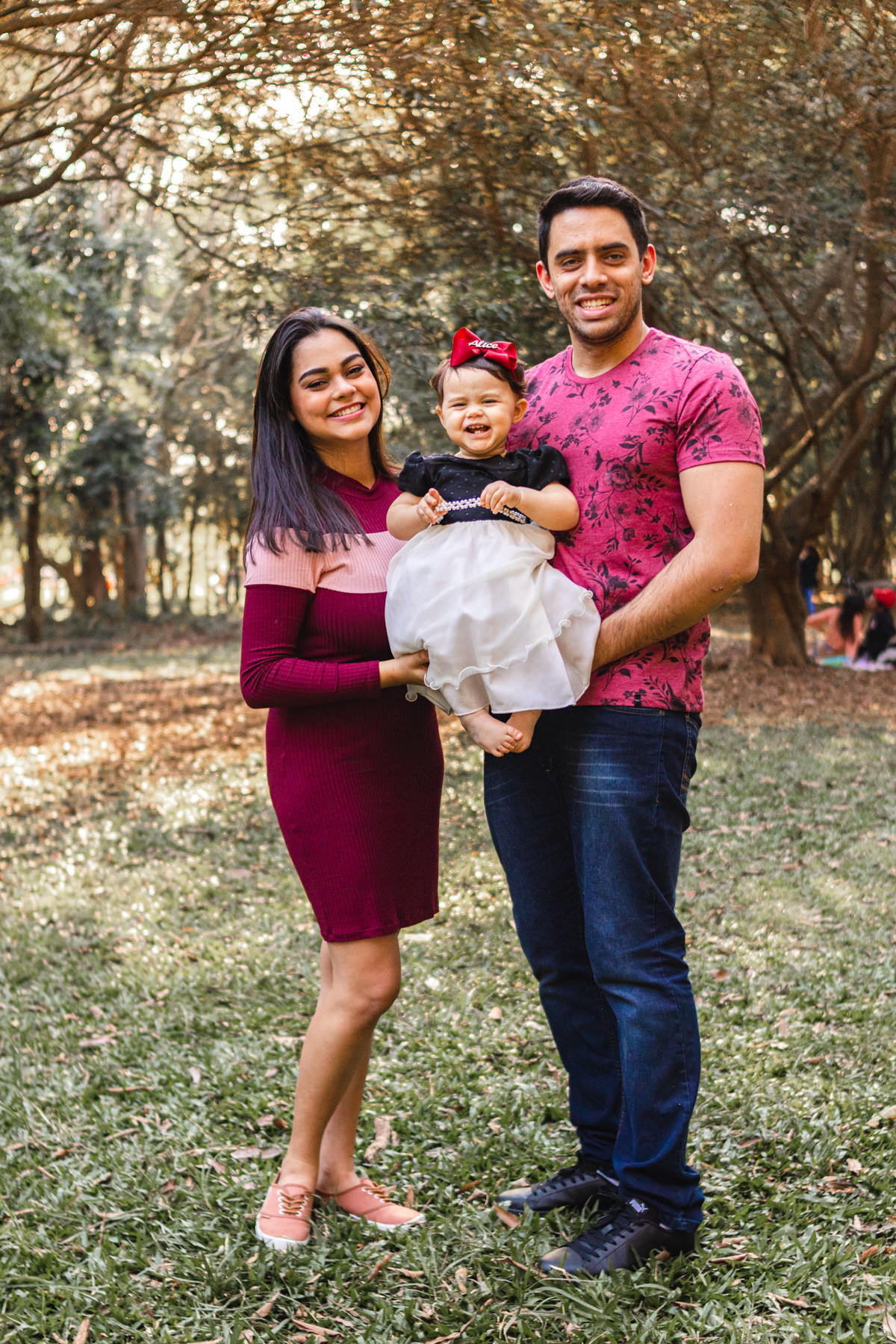 Mãe, pai e filha no Parque Villa Lobos, São Paulo, SP