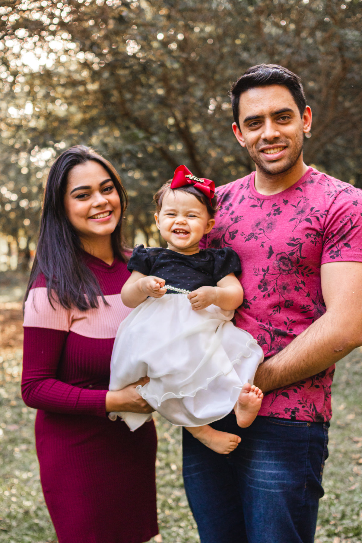 Mãe, pai e filha no Parque Villa Lobos, São Paulo, SP