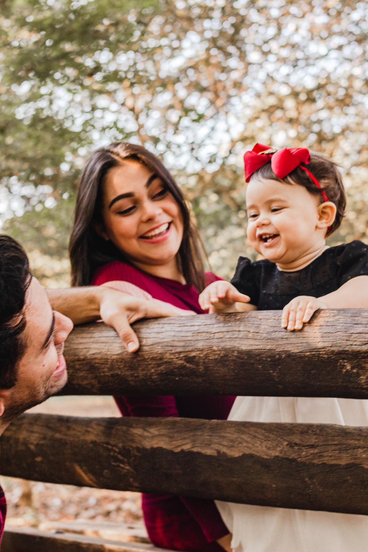 Mãe, pai e filha no Parque Villa Lobos, São Paulo, SP