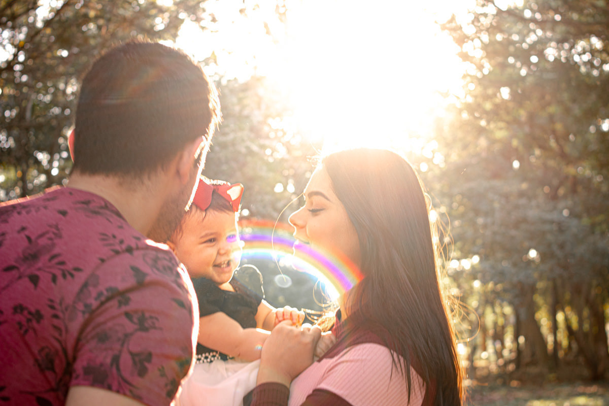 Mãe, pai e filha no Parque Villa Lobos, São Paulo, SP