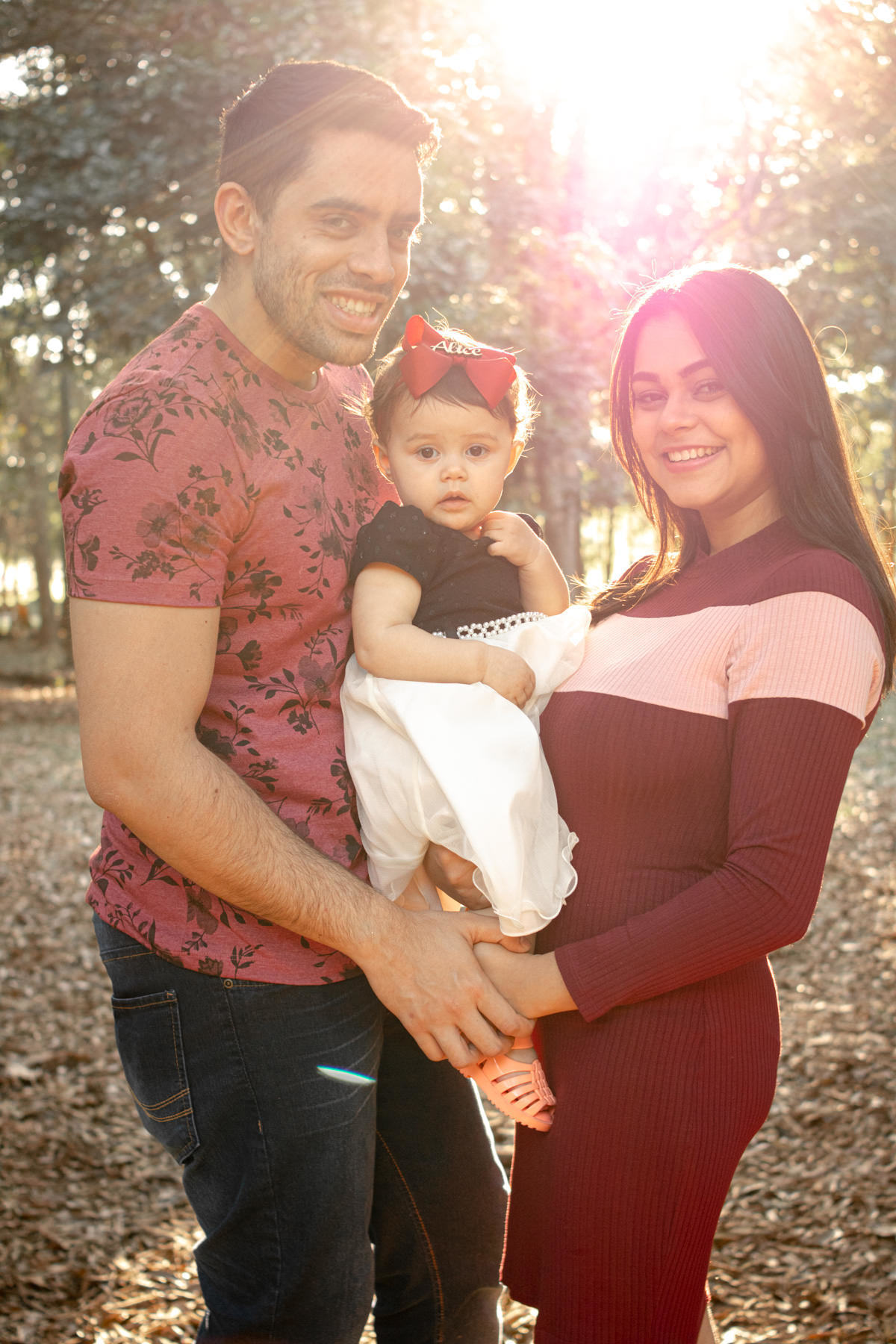 Mãe, pai e filha no Parque Villa Lobos, São Paulo, SP