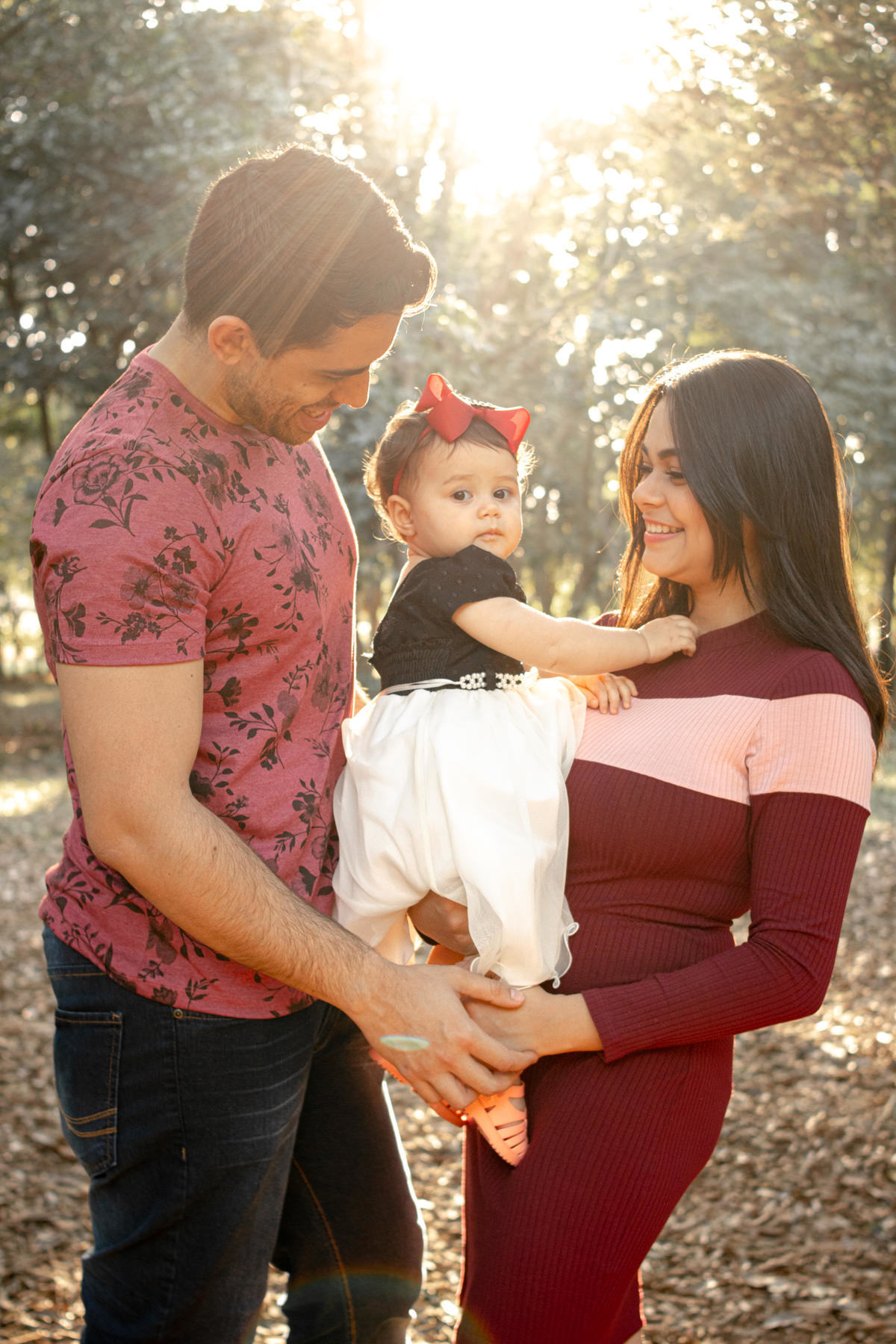 Mãe, pai e filha no Parque Villa Lobos, São Paulo, SP