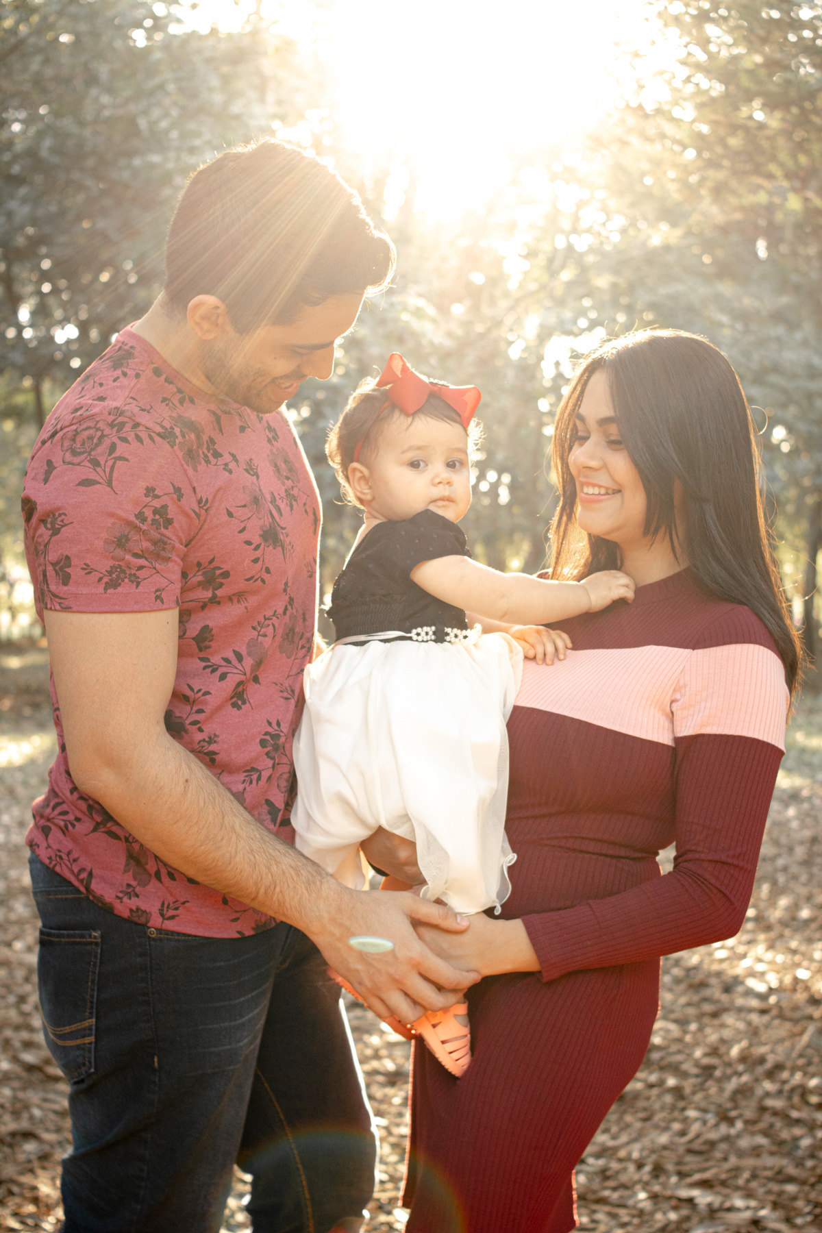 Mãe, pai e filha no Parque Villa Lobos, São Paulo, SP