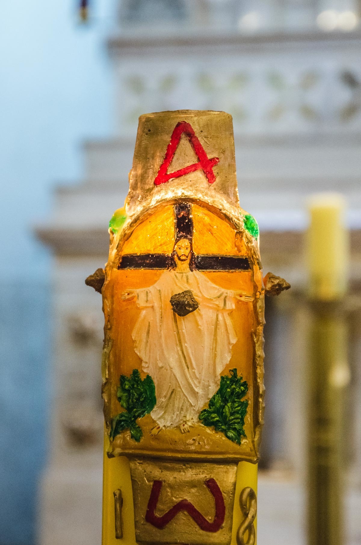 círio pascal em batismo batizado