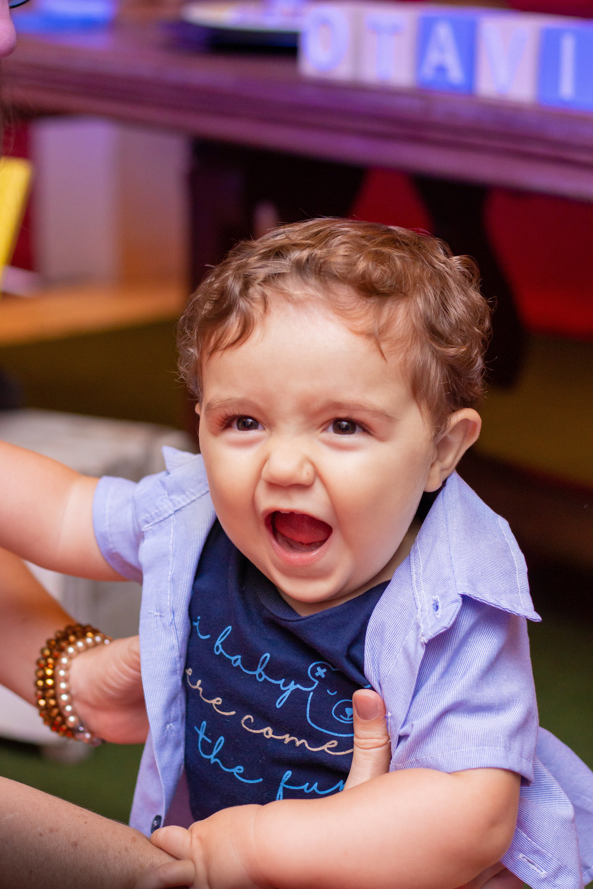 Nenê sorrindo em seu aniversário