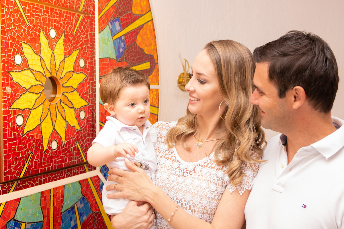 Pais e filho no dia do seu batismo em bauru