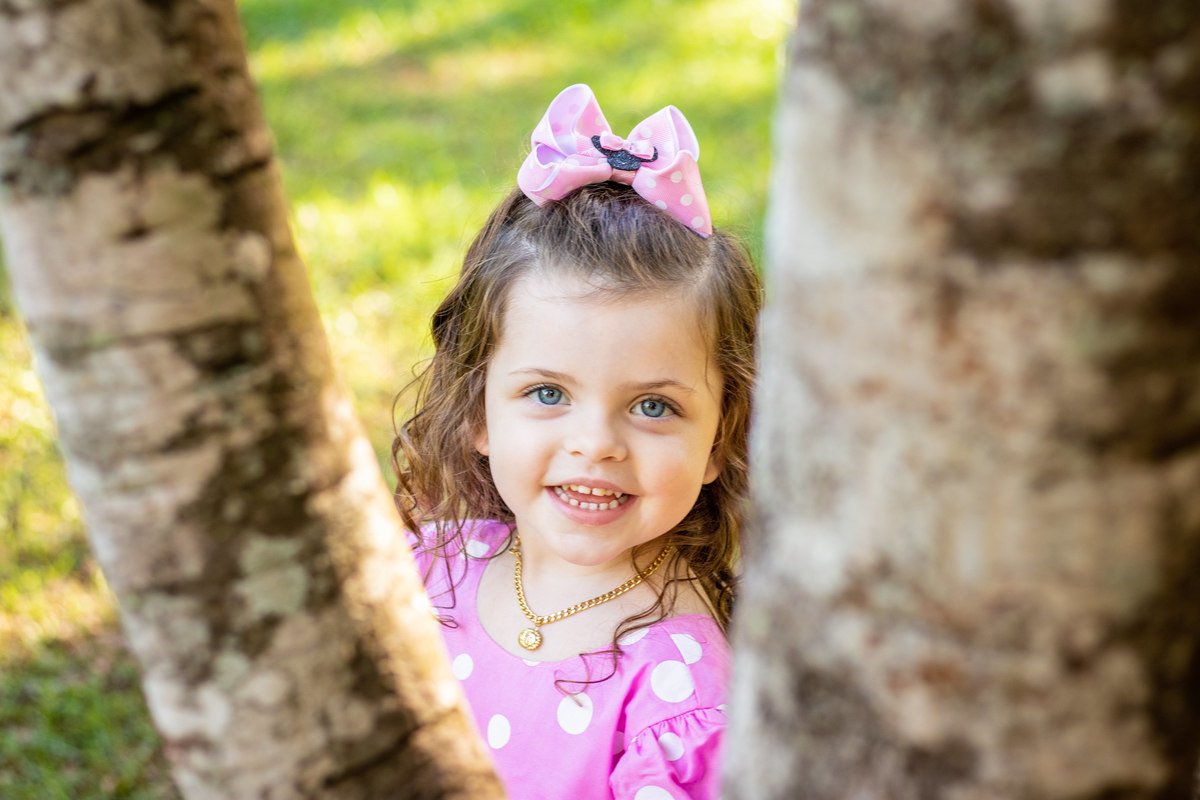 Jardim Botânico de Bauru, Ensaio infantil tema Minnie, criança sorrindo em um ângulo diferente