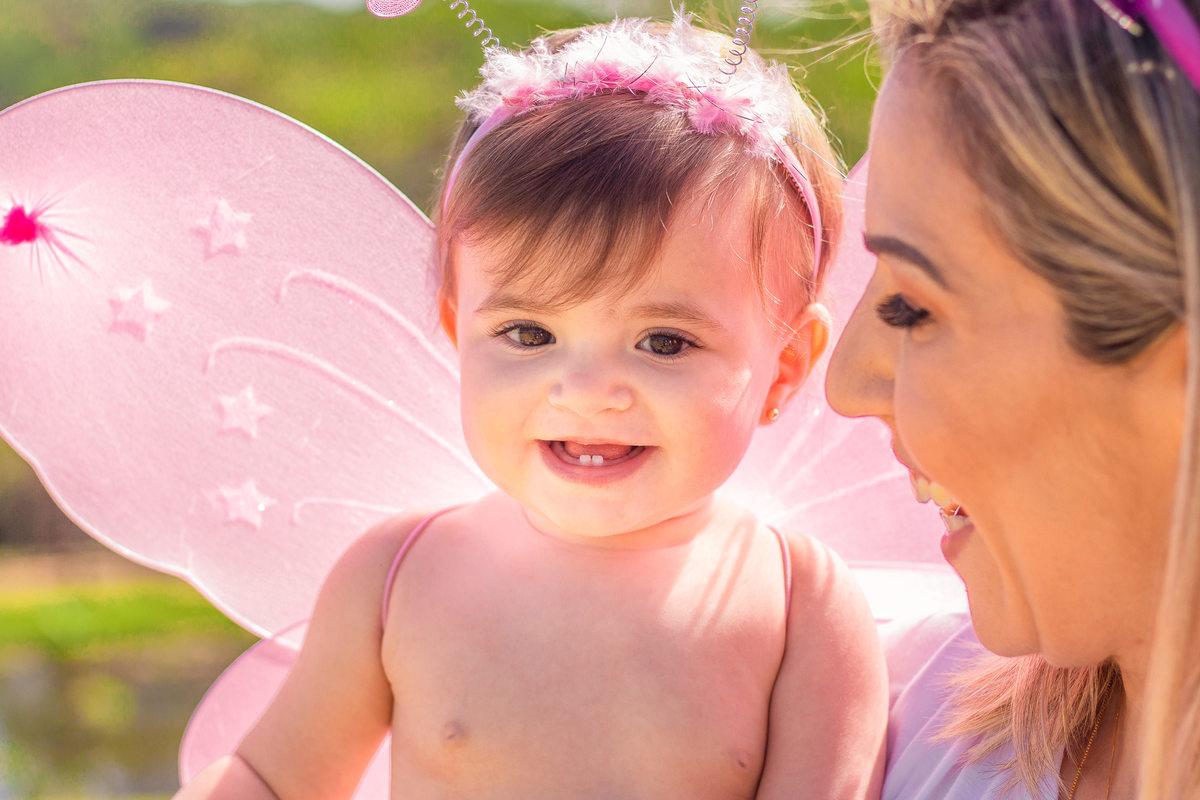jardim botânico de bauru, ensaio externo, ensaio em família externo, bebe sorrindo com seus dentinhos, mãe e filha sorrindo