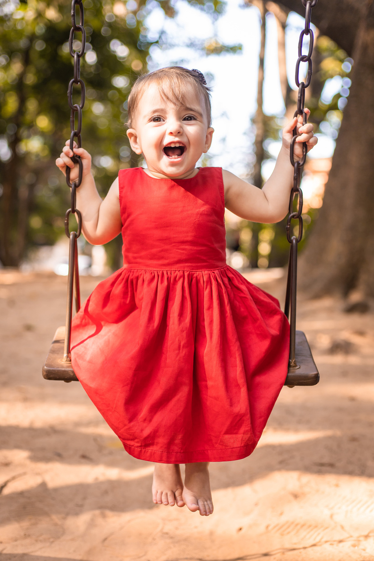 ensaio lifestyle, ensaio em bauru, fotografia em bauru, fotografia lifestyle, fotografia de família, bosque da comunidade bauru, fotografo em bauru, brincando no balanço