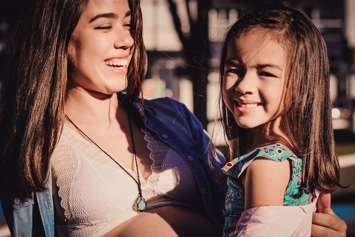  fotografia mãe e filha sorrindo