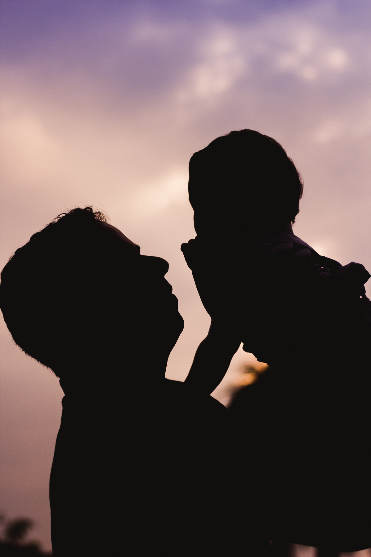 Foto de silhueta pai e filho 