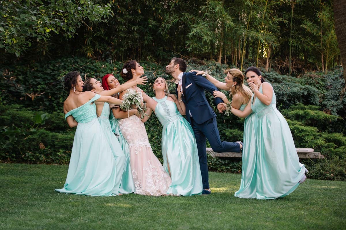 playful wedding photoshoot with the bridesmaids