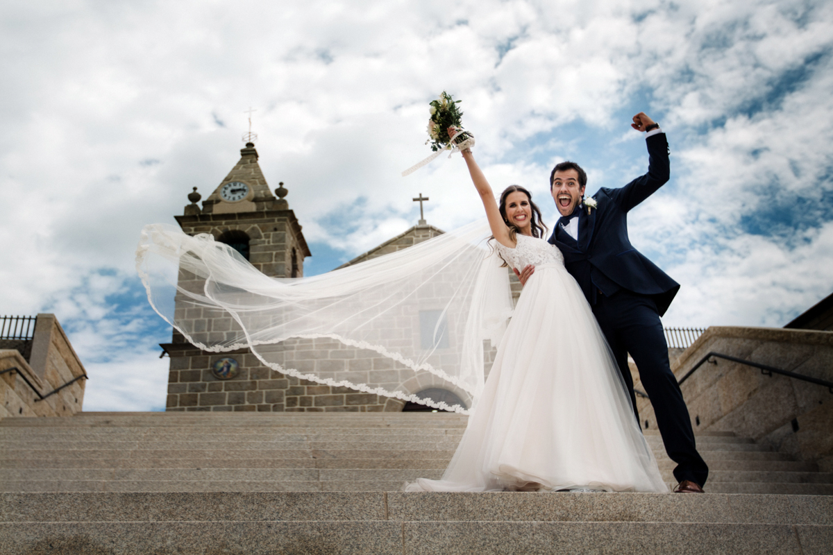 wedding couple celebrate their wedding outside the church