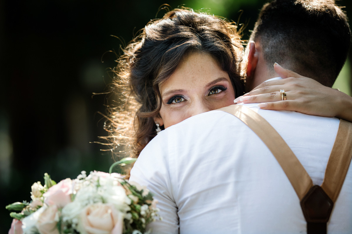 bride hugs the groom 