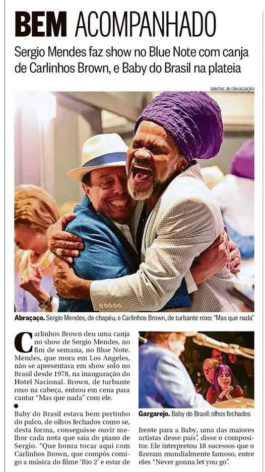 Copia da Coluna Gente Boa do Jornal Oglobo no Rio de Janeiro com as Fotos de Dantas Jr mostrando o encontro de Carlinhos Brown e Sergio Mendes e Baby do Brasil de olhos fechados ouvindo a música.