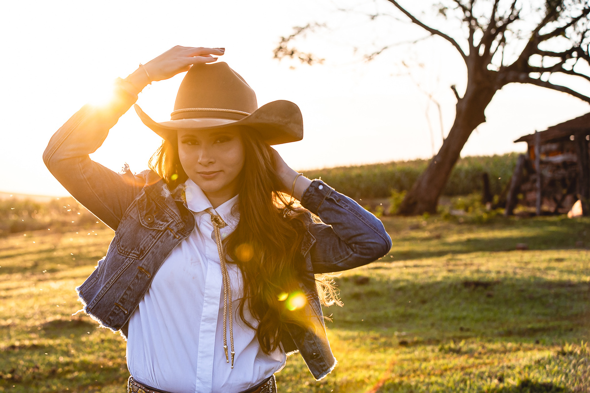 ensaio de 15 anos como tema country na fazenda