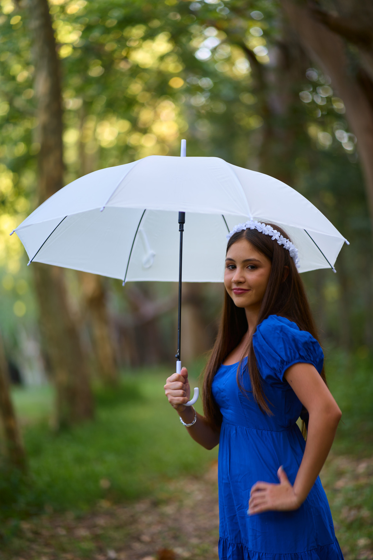 book de anto campestre fotogrsfias por Daniel Cuart de DNX Fotografia FUNES SANTA F foto con paraguas de quinceañera
