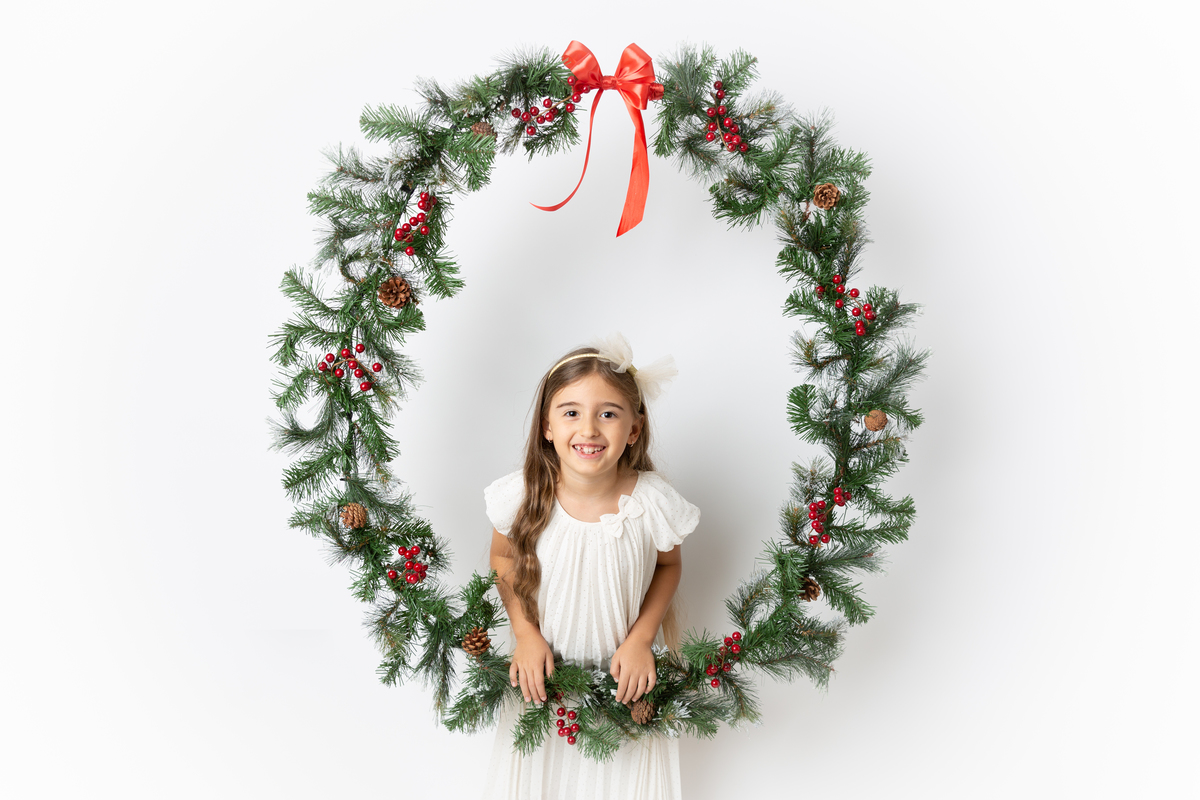 Linda com a coroa de Natal