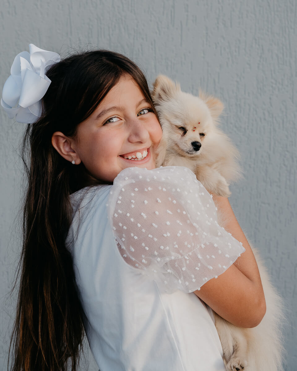Alicia e Lola em momento de alegrias durante o ensaio de família, pela fotógrafa Fabiana Bomfim
