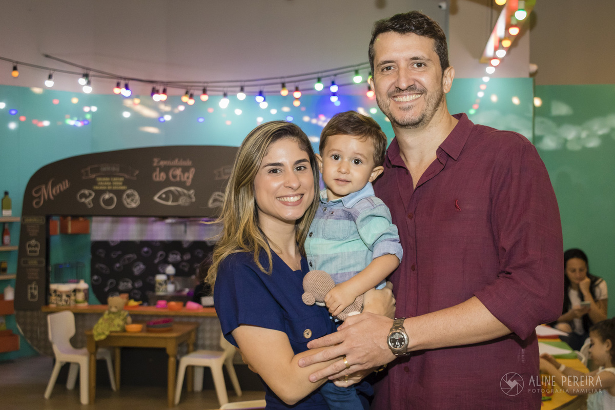 pai, mãe e filho na Animasom do Shopping Leblon