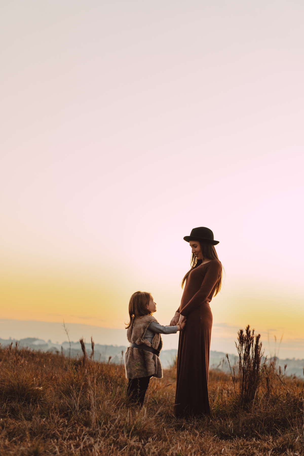 Ensaio mãe e filha no pôr do sol