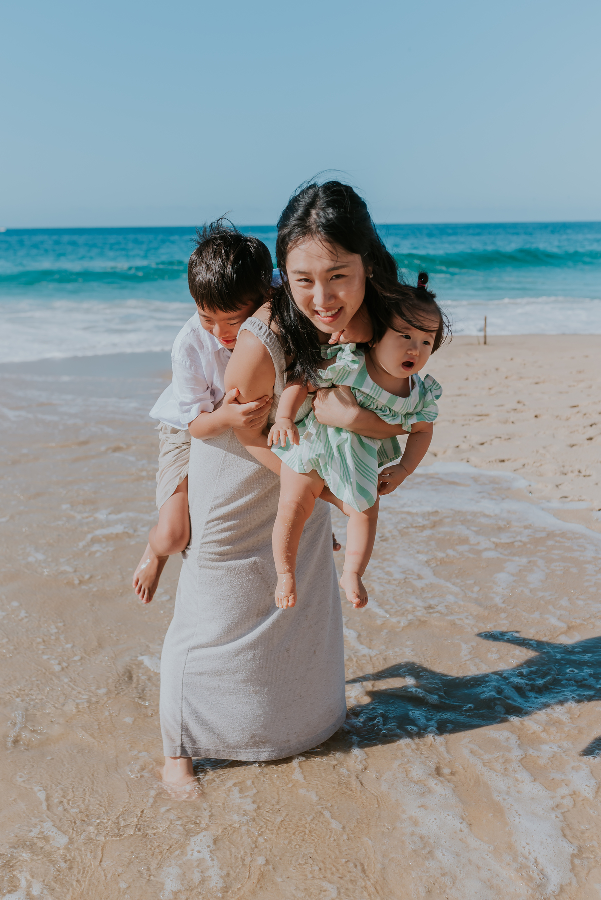 fotografia ensaio de familia externo praia Leblon Rio de Janeiro zona sul familia japonesa fotografa bruna guerson