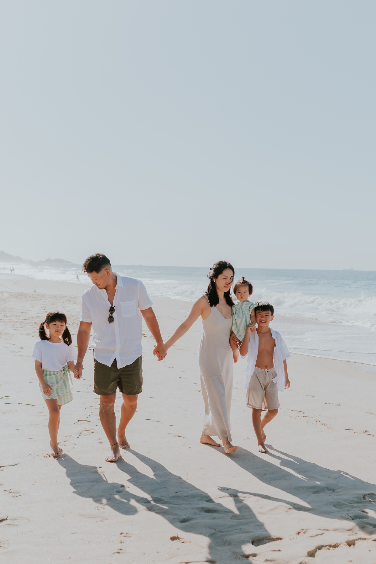 fotografia ensaio de familia externo praia Leblon Rio de Janeiro zona sul familia japonesa fotografa bruna guerson