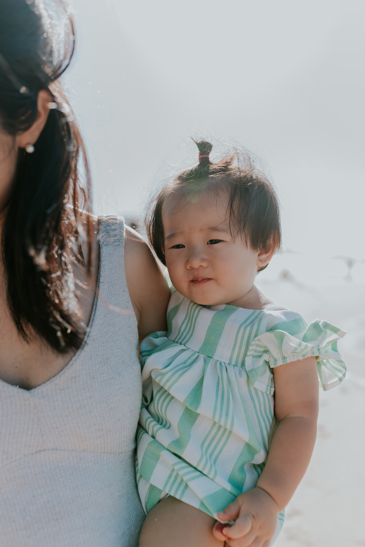 fotografia ensaio de familia externo praia Leblon Rio de Janeiro zona sul familia japonesa fotografa bruna guerson