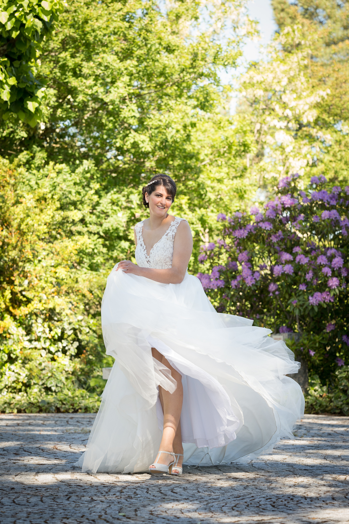 fotografia de noiva a rodar o vestido