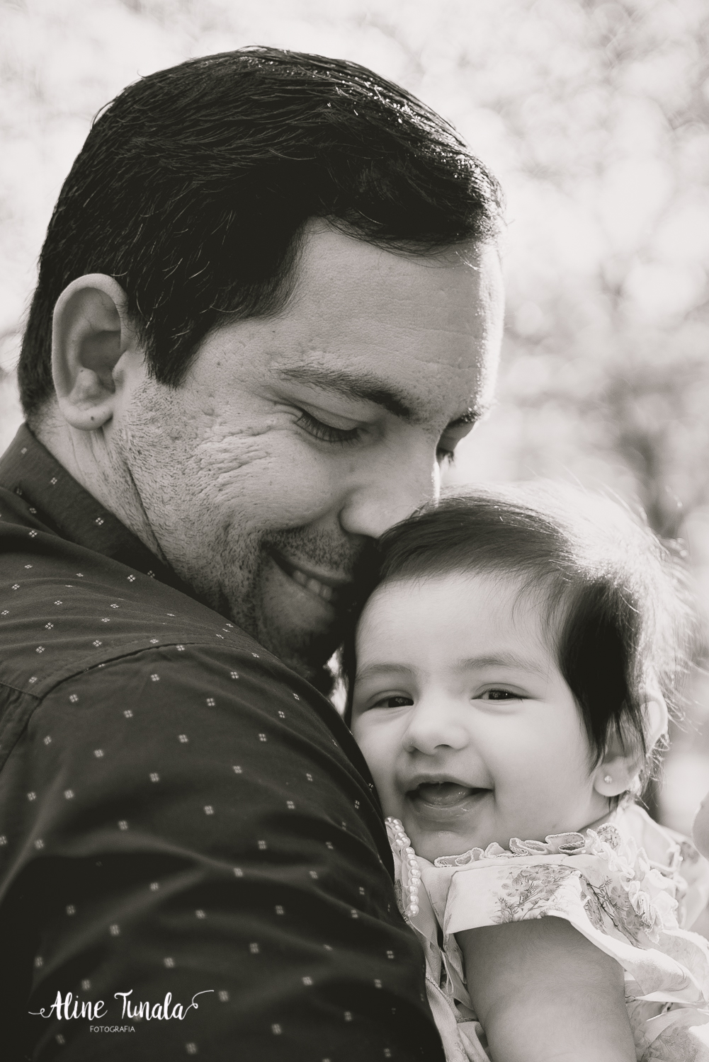 pai e filha de 4 meses na sua sessão de acompanhamento