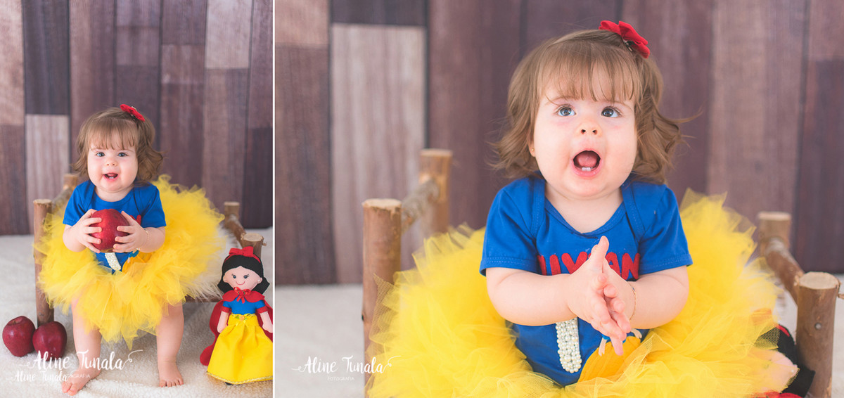 Foto temática Branca de Neve para aniversário de 1 aninho com maçãs em estúdio. Sessão infantil, ensaio infantil. 1 ano