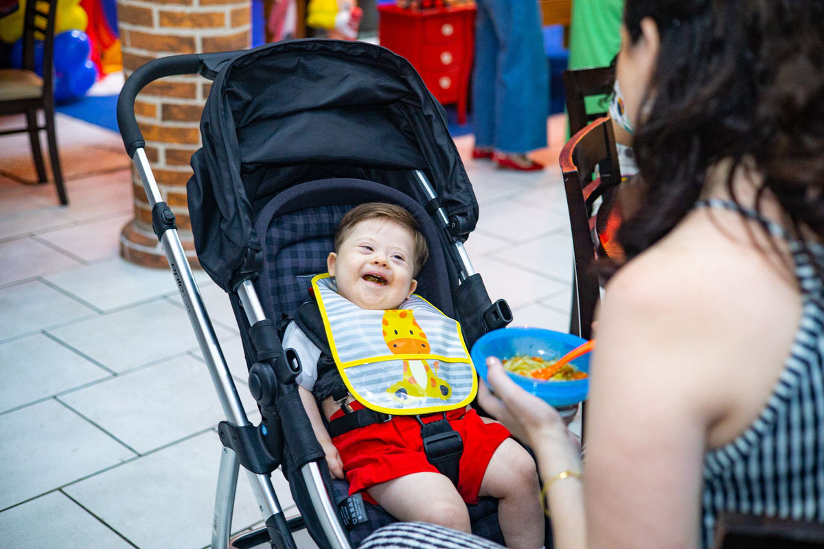 Fotógrafo de criança com Síndrome de Down
