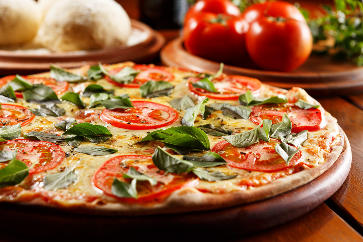 Deliciosa pizza marguerita na fotografia de Romero cruz