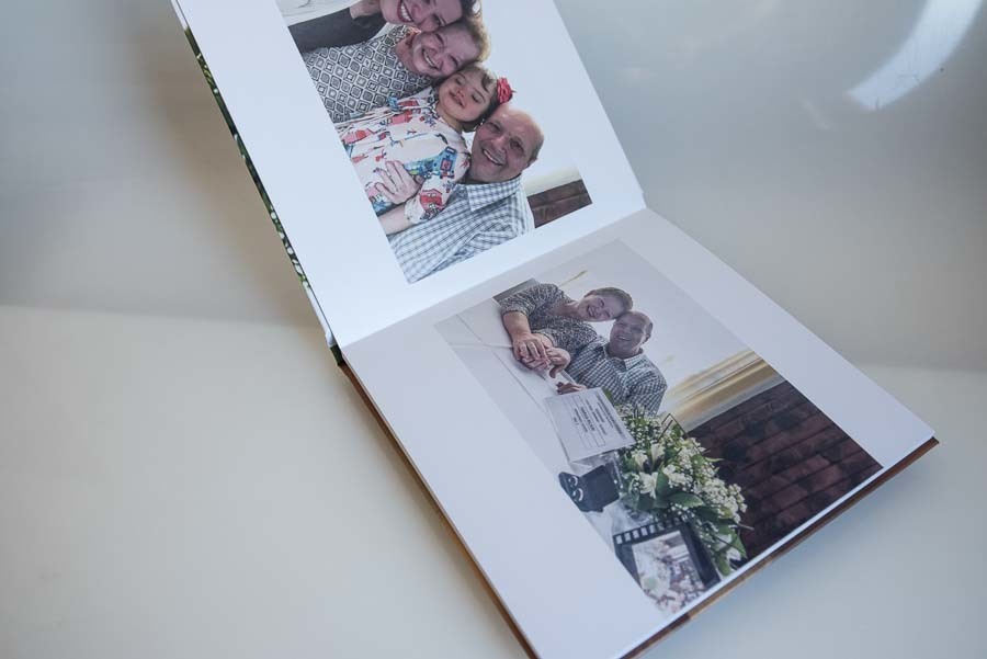 detalhe das paginas de internas do album vera e ricieri bodas de esmeraldas  santo andre, SP album de fotos restauradas coloridas e pb  abertura panoramica papel couche  por clovis augusto mundareu albuns